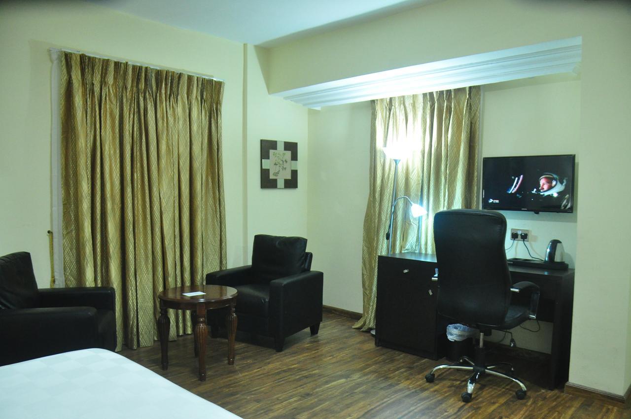 Citiheight Hotel Икея Экстерьер фото